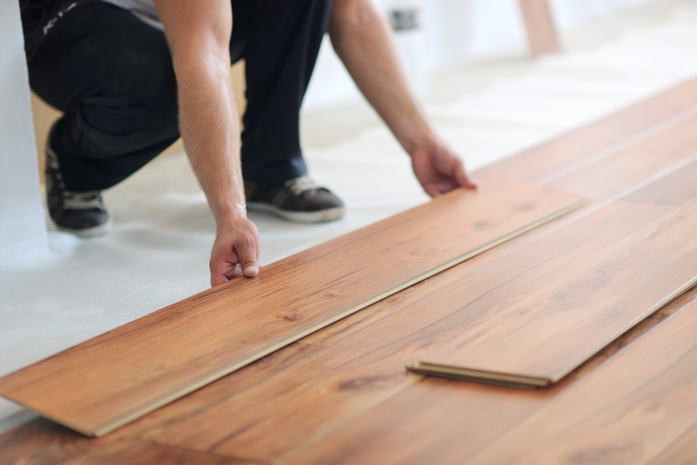Installing laminate flooring in new home indoor
