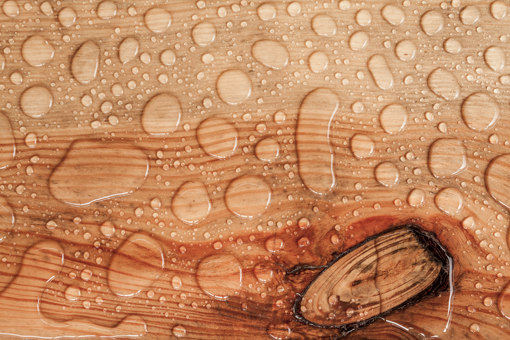 water drop on a wooden background